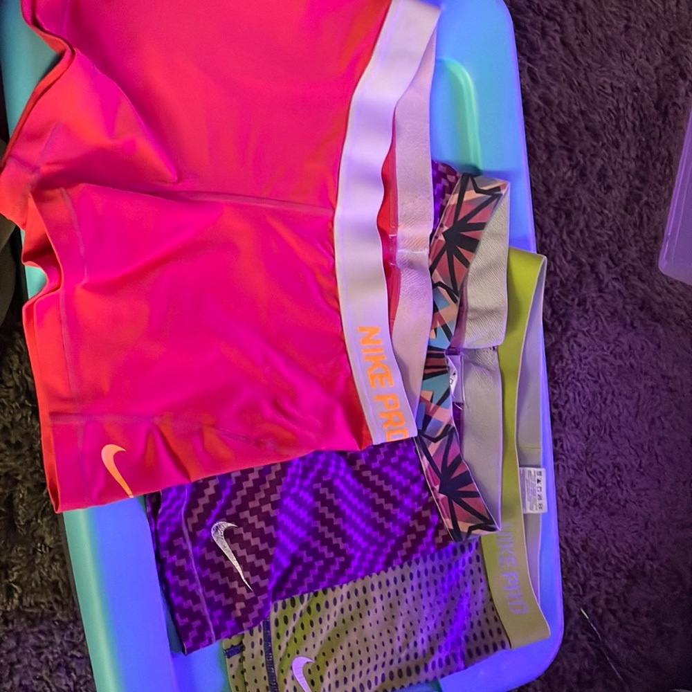 (3) pairs of Nike compression shorts